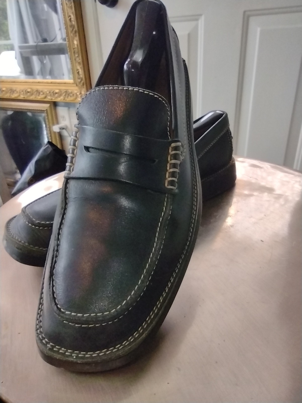 Tod's Black Leather Penny Loafers with Contrast Stitching